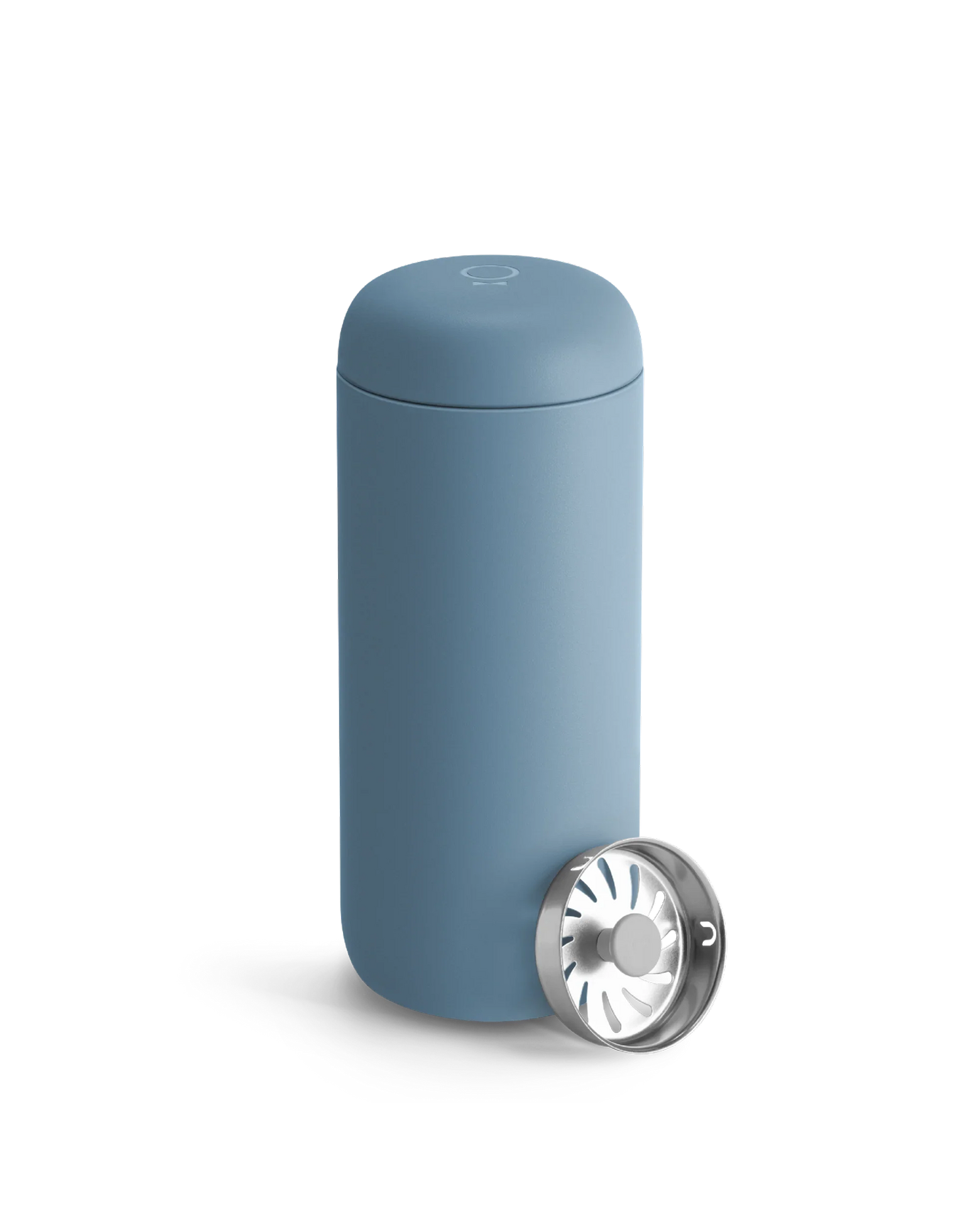 A Fellow Carter Move Mug in blue sits beside its metal strainer on a white background.