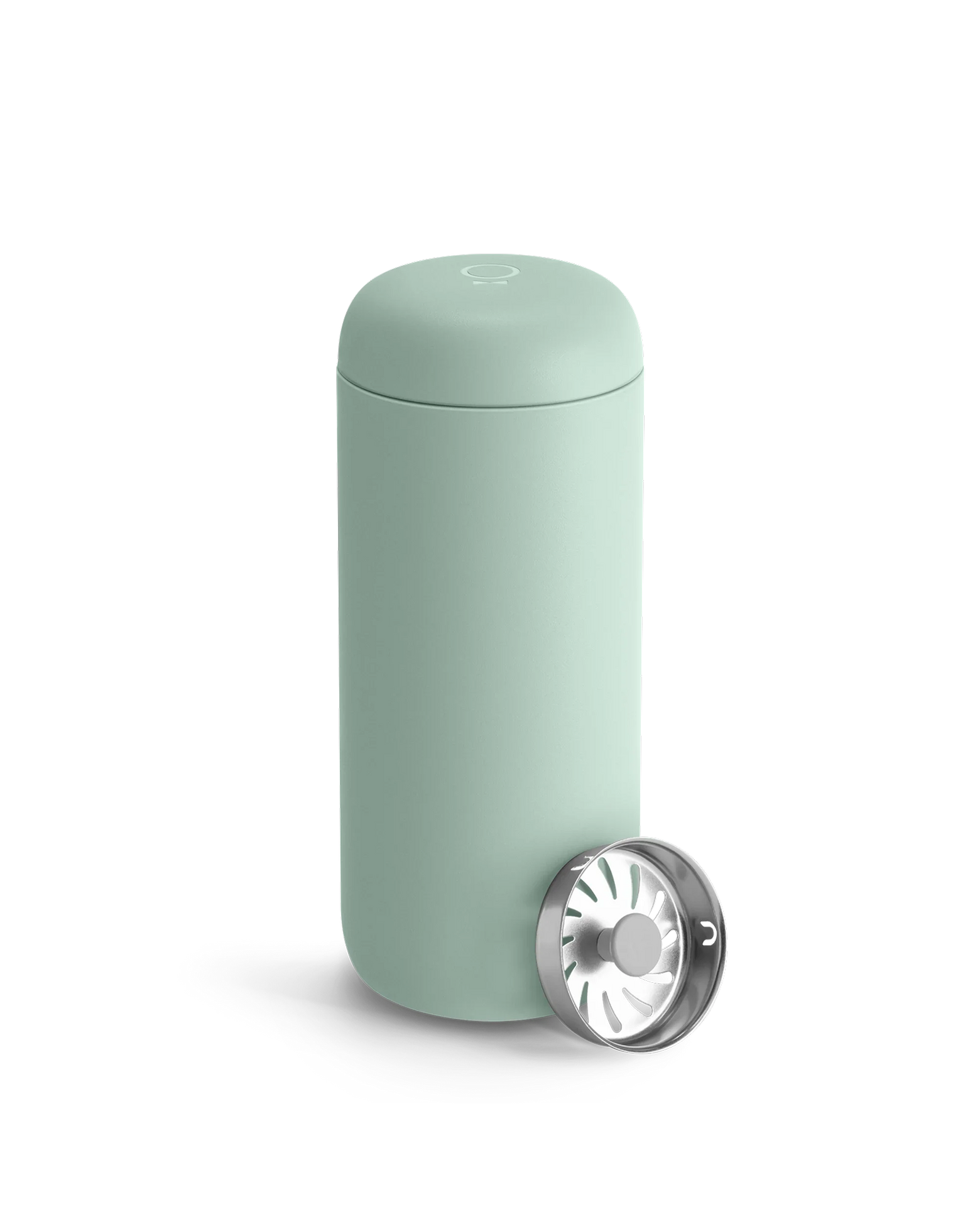 Fellow Carter Move Mug in light green with stainless steel strainer on a white background.