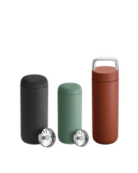 The Fellow Carter Mug Trio: three insulated travel mugs with strainers, ideal for coffee.