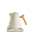 Fellow Corvo EKG Electric Kettle in cream with wood handle and lid, on matching base.
