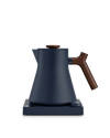 The Fellow Corvo EKG Electric Kettle is a fast, stylish matte navy kettle with wooden handle.