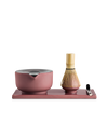 Fellow Matcha Set in Desert Rose with bamboo whisk and handmade bowl on white background.