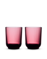 Two Fellow Pirch Espresso Glasses in pink displayed on a white background.