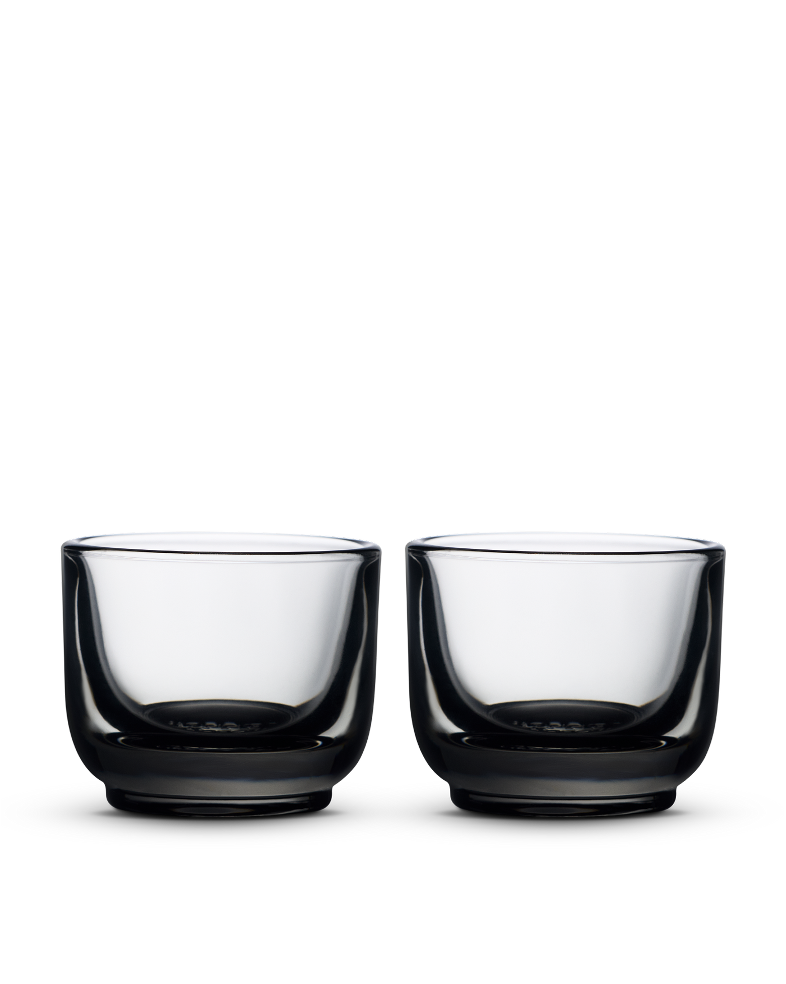 Two Fellow Pirch Espresso Glasses, thick-based, side by side on a white background.