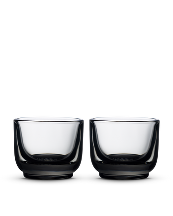 Two Fellow Pirch Espresso Glasses, thick-based, side by side on a white background.
