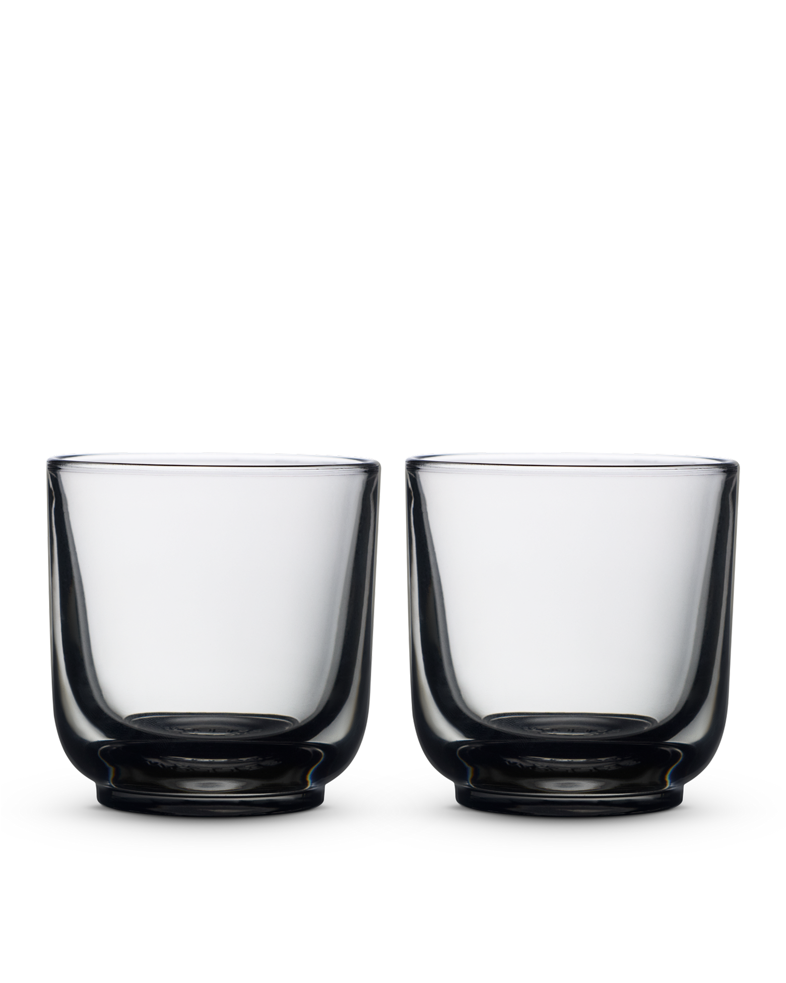 Two Pirch Espresso Glasses by Fellow sit side by side on a plain white background.