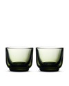 Two Pirch Espresso Glasses by Fellow, green, set side by side on a white background.