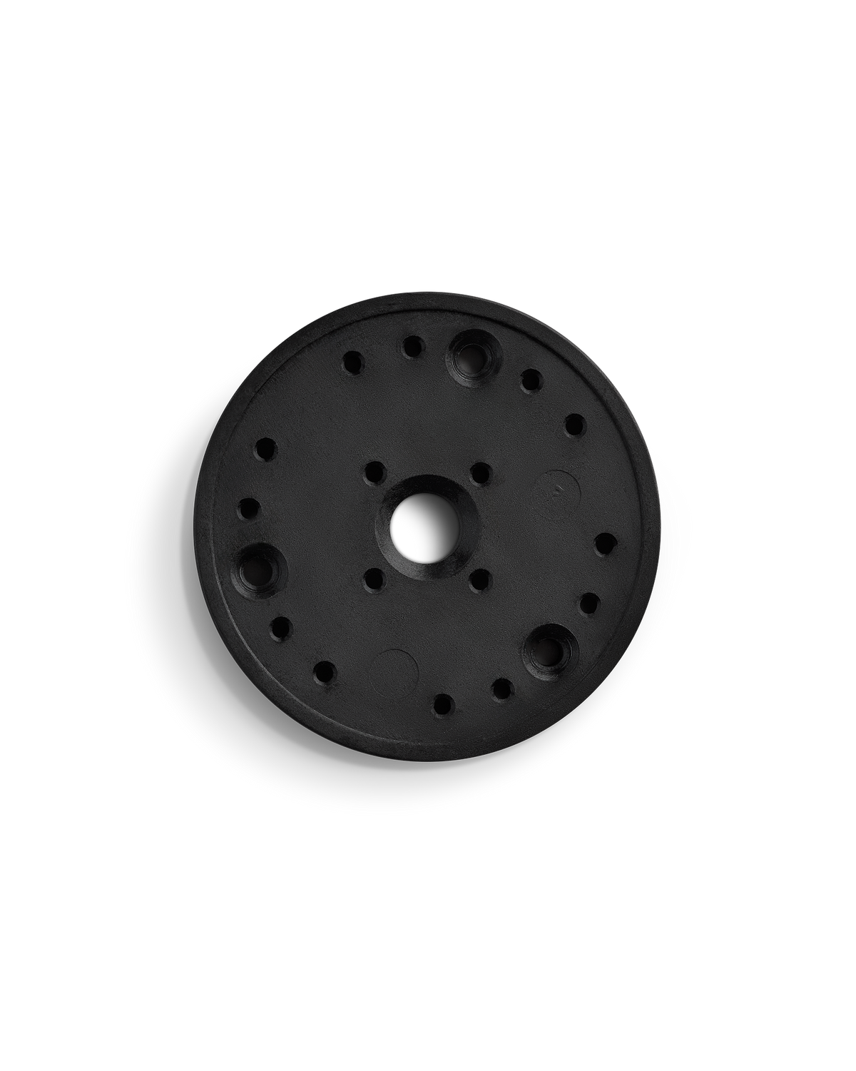 Fellow Espresso Series 1 Dispersion Block—round black plastic with multiple holes, top view.