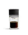 The Fellow Stagg [X] Pour-Over Set brews coffee into a glass carafe for optimal extraction.