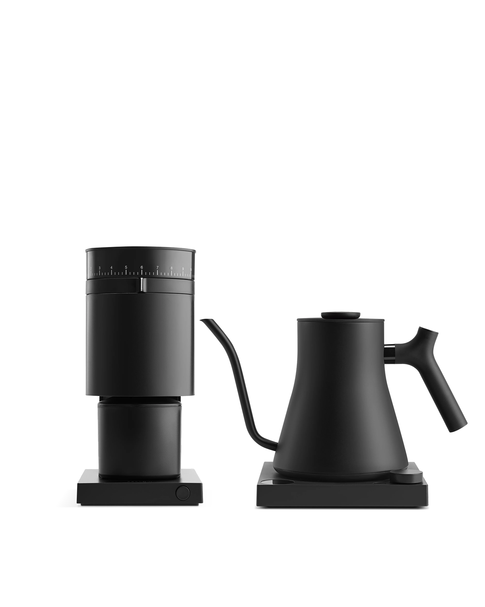 Fellow's The Electric Kit: sleek black grinder and kettle on square bases, white background.