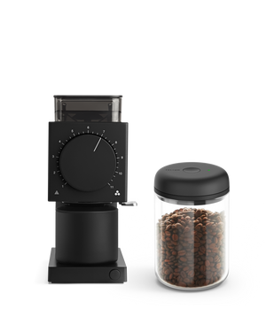 The Fellow Grind It Kit: a black coffee grinder with an airtight container for fresh beans.