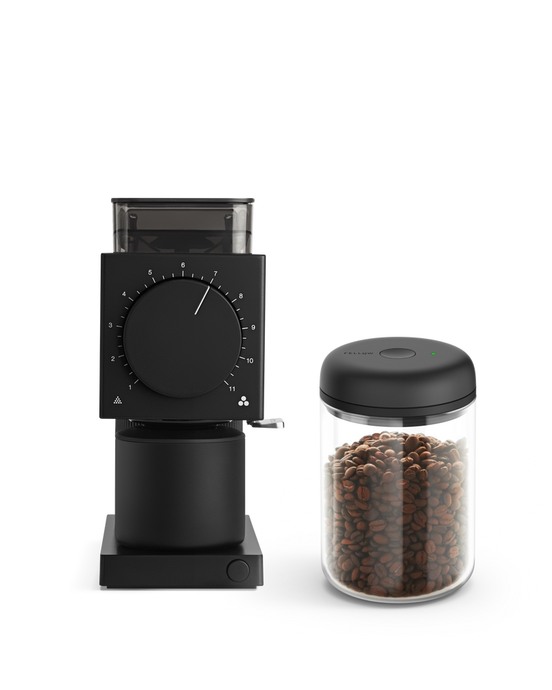 The Fellow Grind It Kit: a black coffee grinder with an airtight container for fresh beans.