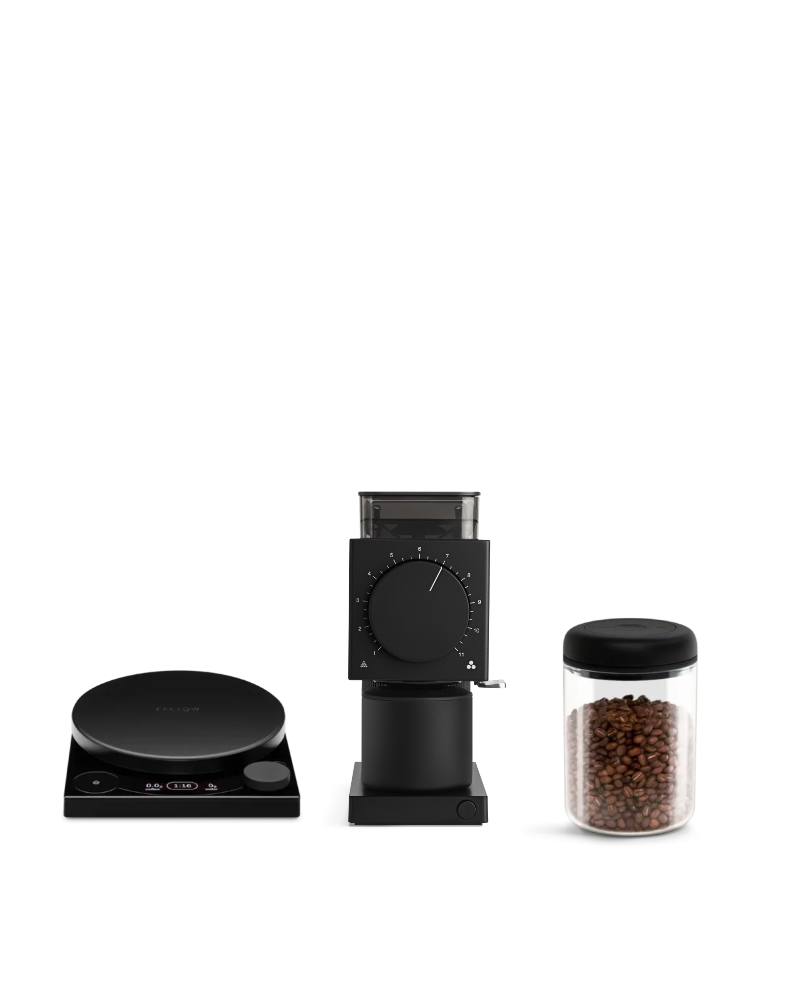 Fellow’s The Weigh To Go Kit: scale, grinder, and canister of beans on a white background.