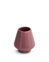 A small, glossy Desert Rose Matcha Set Whisk Holder by Fellow with a wide base and narrow opening.